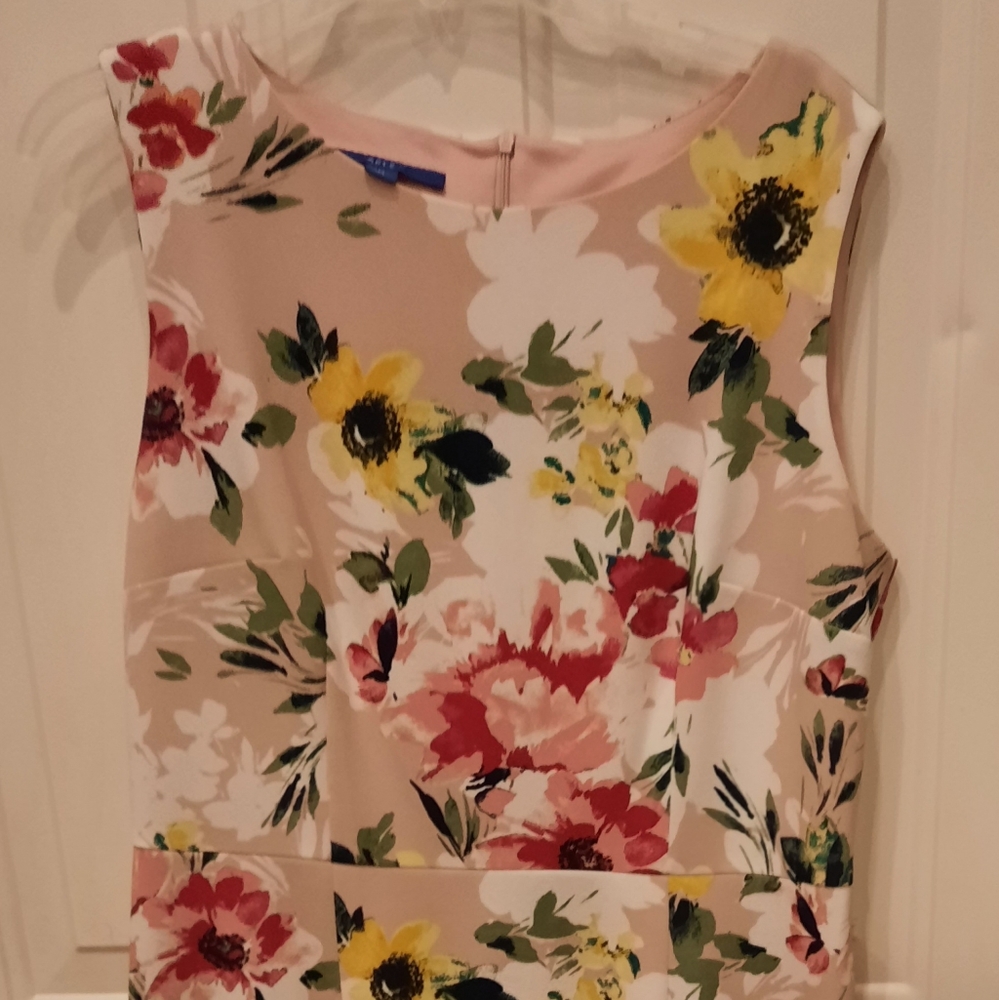 Floral dress only wore once to daughter's wedding. Have not worn since.